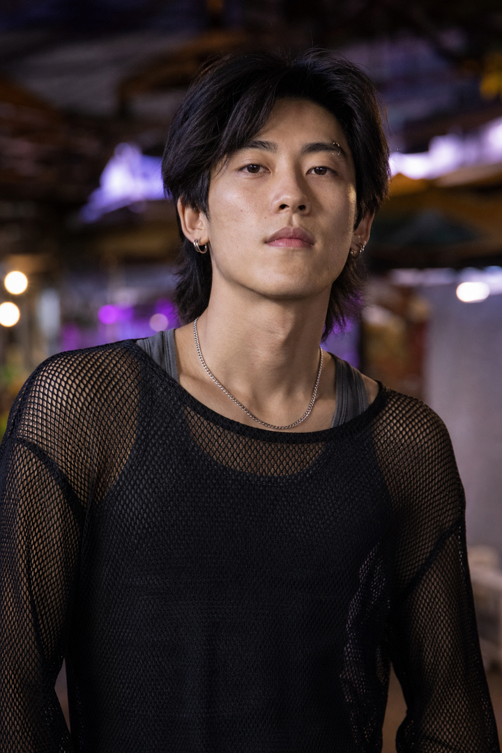 Black Mesh Layers and Gunmetal Eyebrow Rings for Night-Market Style