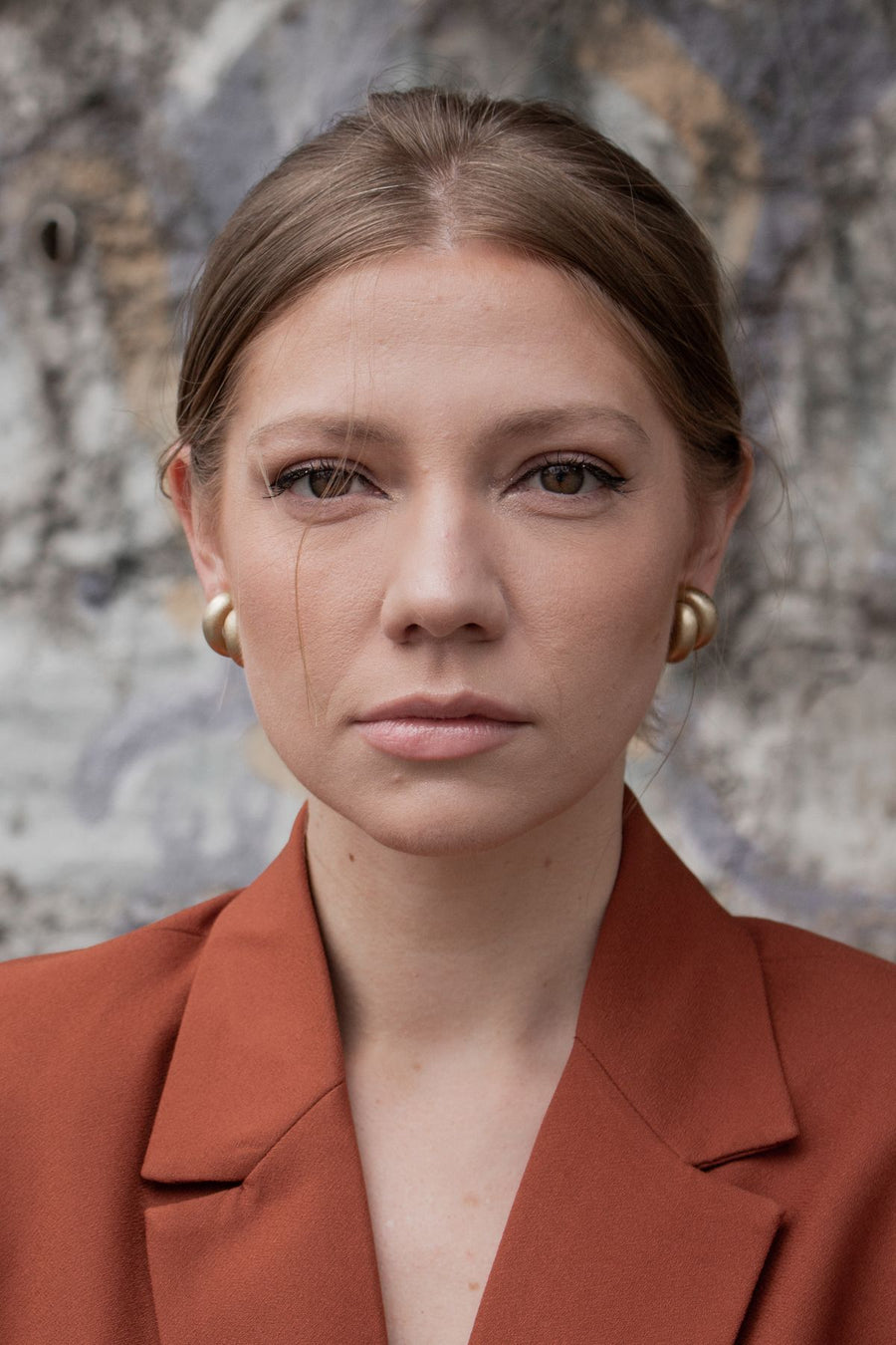 Rust Blazer, Rounded Gold Earrings, and Stone-Wall Mornings