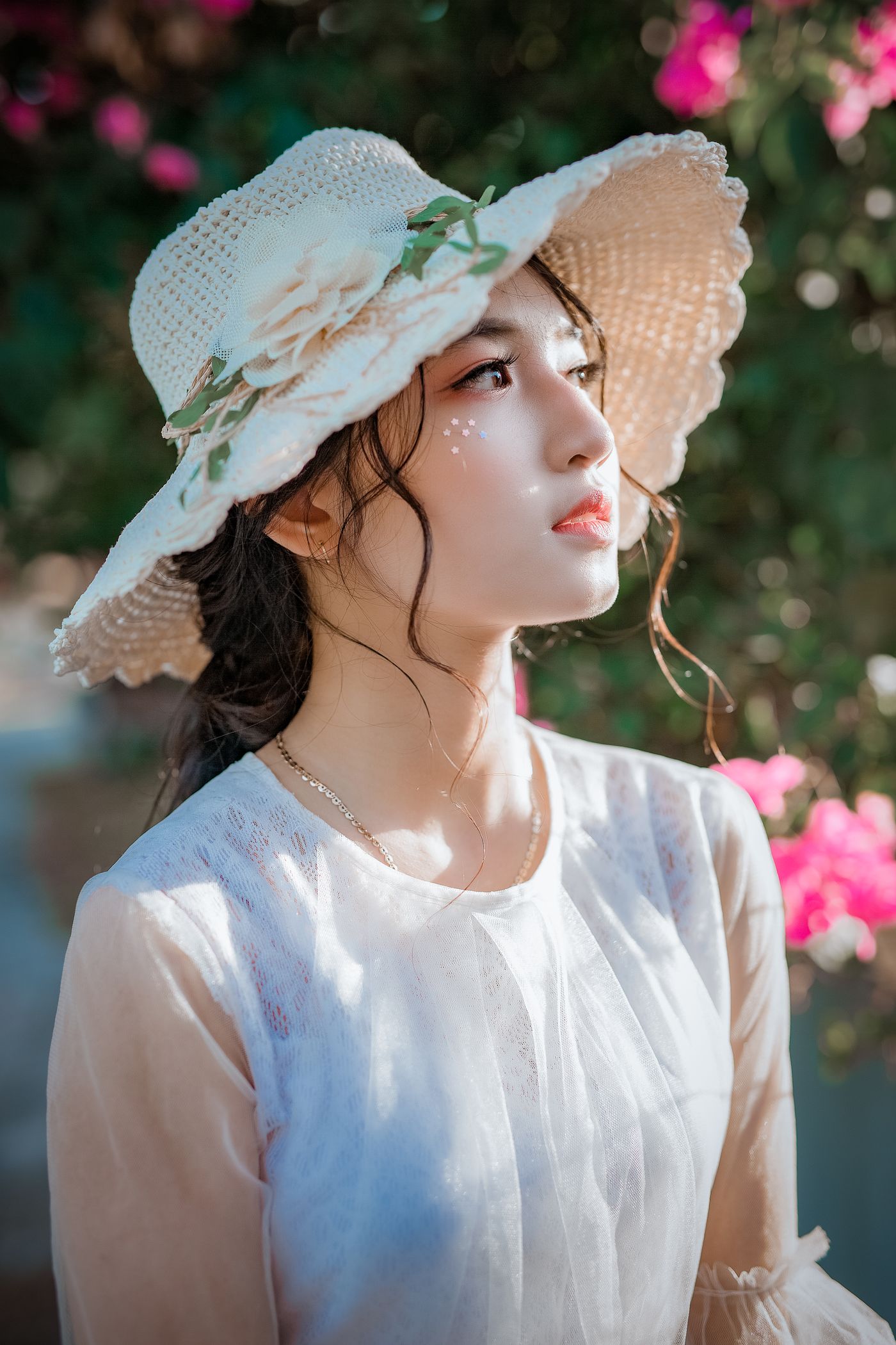 Portrait of a model in a black fashion look with clear face detail